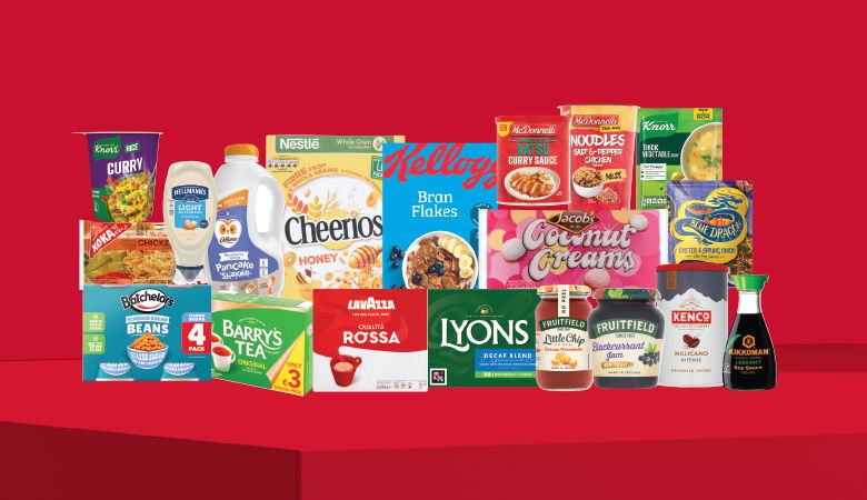 A promotional image displaying various grocery items against a red backdrop.