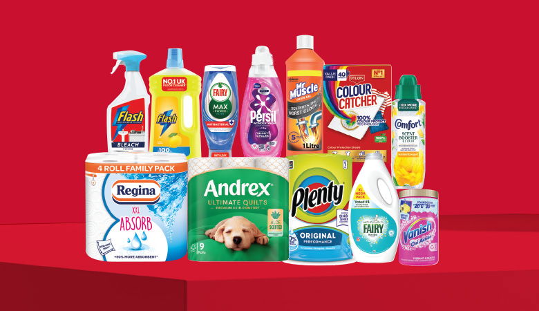 A promotional image showcasing various household cleaning and laundry products against a red backdrop.