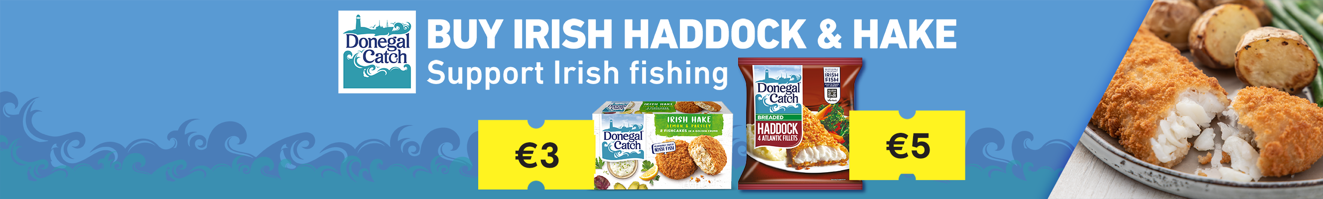 The Donegal Catch logo, featuring a stylized lighthouse, and the text "BUY IRISH HADDOCK & HAKE. Support Irish Fishing." in large white letters. In the center, there are two images of Donegal Catch seafood products: A yellow tag with the price "€3" in black.  A package of Irish Hake Lemon & Parsley fishcakes with a price of "€5" in black. The package shows two golden-brown fishcakes on a plate with lemon slices and parsley. The bottom of the banner has a green "Shop Now" button with a white arrow pointing to the right.