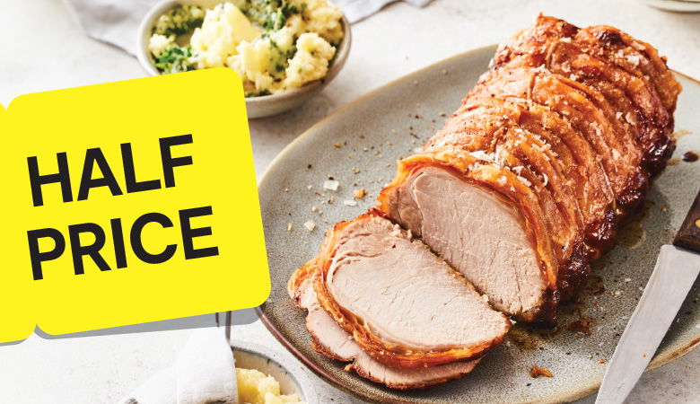 Promotional image featuring a perfectly cooked roast beef. A yellow tag on the left corner prominently reads 'better than half price' in bold black text, emphasizing the discount offer. 