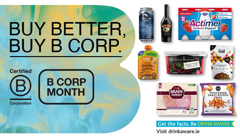 An advertisement promoting B Corp-certified products features the slogan "BUY BETTER, BUY B CORP." on a blue and yellow abstract background. The Certified B Corporation logo and "B CORP MONTH" text are displayed. Various food and drink products, including Actimel, Brady Family ham, Ella's Kitchen chicken casserole, Fiid meal, Baileys, Wicklow Wolf beer, sweet potato fries, and Cully & Sully soup, are arranged on the right. A "Be Drinkaware" message and website link are at the bottom.