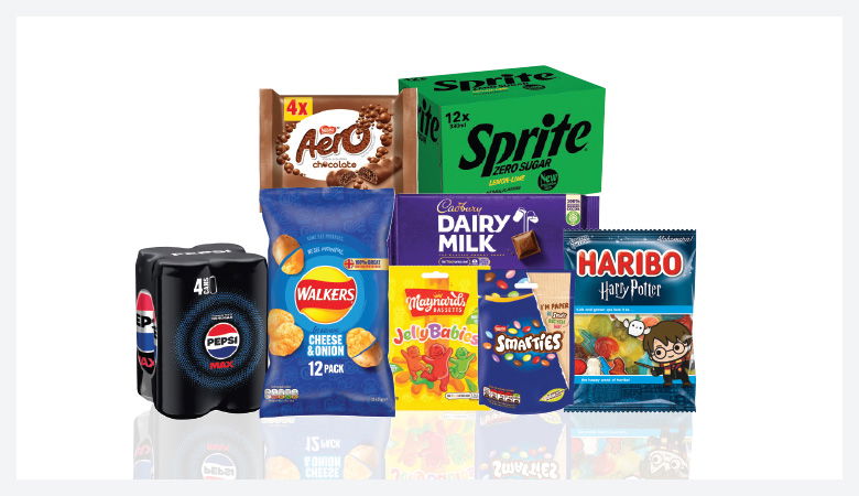 A promotional image showcasing a variety of snack foods and drinks against a red backdrop.