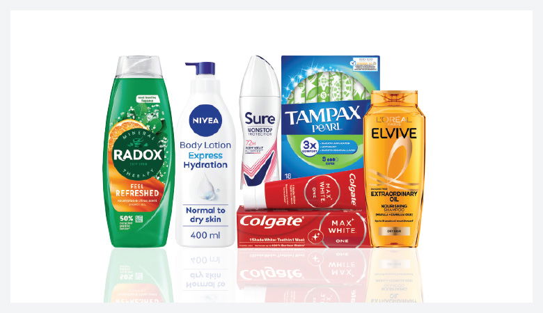 A promotional image showcasing various personal care products against a red backdrop.