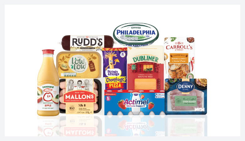 A promotional image showing a variety of food products arranged on a red background.