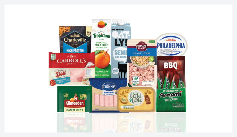 A promotional image showing a variety of food products arranged on a red background.
