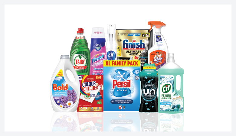 A promotional image showcasing various household cleaning and laundry products against a red backdrop.