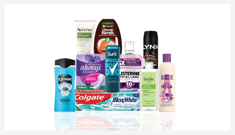 A promotional image showcasing various personal care products against a red backdrop.