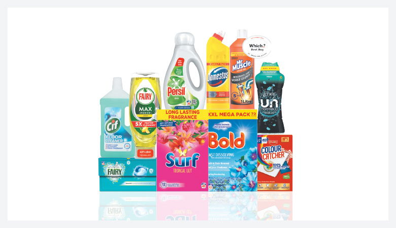 A promotional image showcasing various household cleaning and laundry products against a red backdrop.