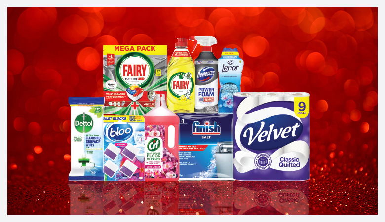 A promotional image showcasing various household cleaning and laundry products against a red backdrop.