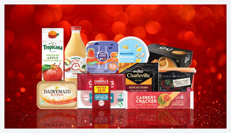 A promotional image showing a variety of food products arranged on a red background.