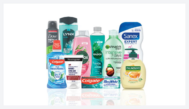 A promotional image showcasing various personal care products against a red backdrop.