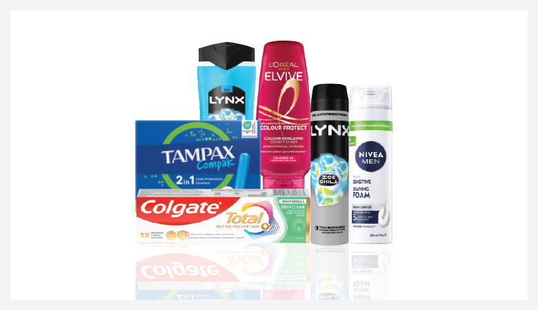 A promotional image showcasing various personal care products against a red backdrop.