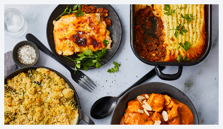 perfectly cooked steak with a pat of butter on top, garnished with fresh rosemary. 