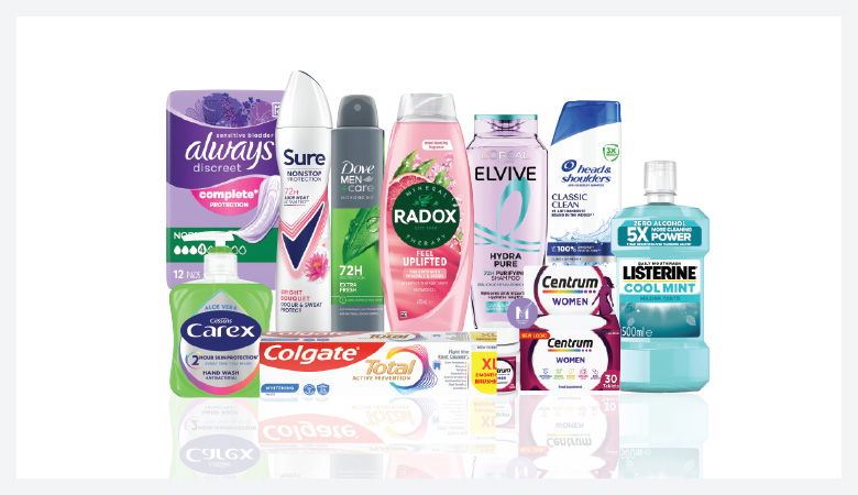 A promotional image showcasing various personal care products against a red backdrop.