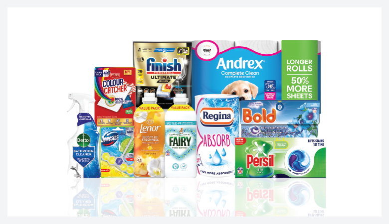 A promotional image showcasing various household cleaning and laundry products against a red backdrop.