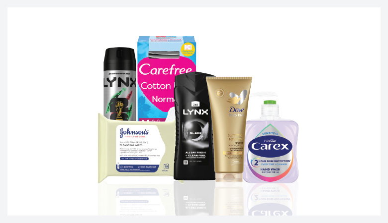 A promotional image showcasing various personal care products against a red backdrop.