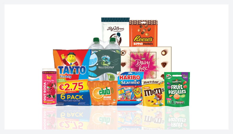 A promotional image showcasing a variety of snack foods and drinks against a red backdrop.