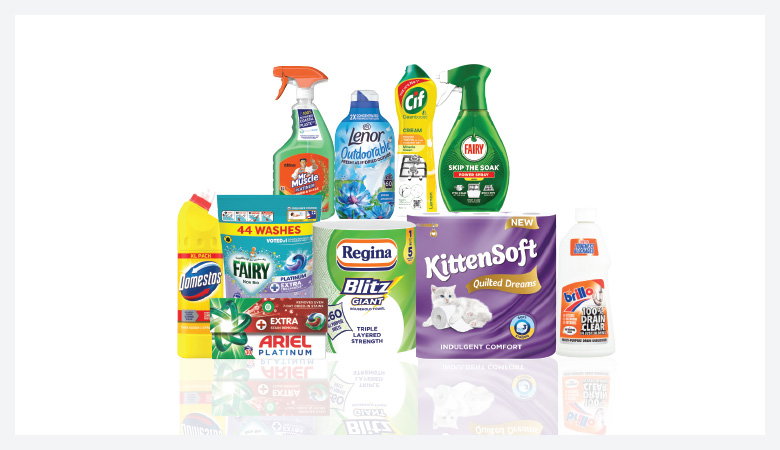 A promotional image showcasing various household cleaning and laundry products against a red backdrop.