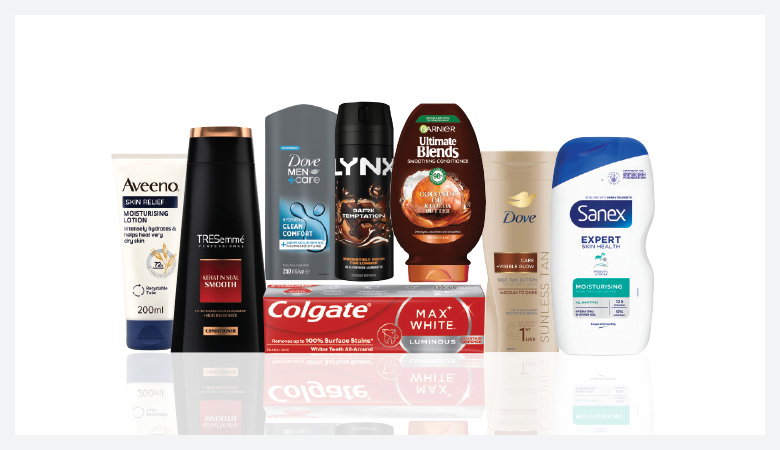 A promotional image showcasing various personal care products against a red backdrop.